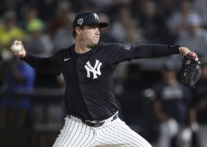 Image of Gerrit Alan Cole, professional baseball pitcher for the New York Yankees, throwing a ball during a game