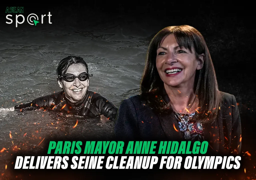 Paris Mayor Anne Hidalgo smiles while swimming in the Seine River, showcasing the successful cleanup efforts ahead of the Paris Olympics.